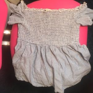 Off the shoulder blue top.